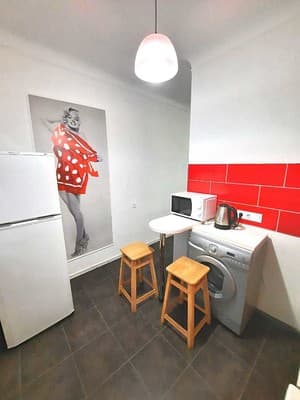 Alex Apartments. White rotunda. 13