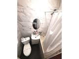 Alex Apartments. White rotunda. 16