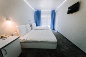 Отель Гостевия. Улучшенный 4-местный Стандарт 3-й корпус 1