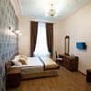 Мини-отель Inn Lviv. Семейный 4-местный люкс с двумя спальнями 1