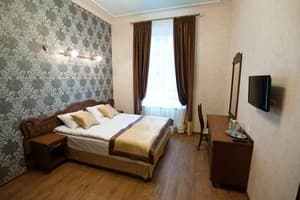 Мини-отель Inn Lviv. Семейный 4-местный люкс с двумя спальнями 3